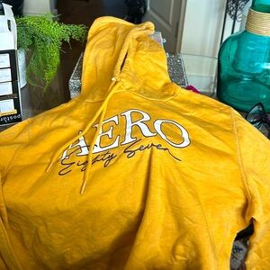 Gold color hoodie that’s from Aeropostale that’s a size l
